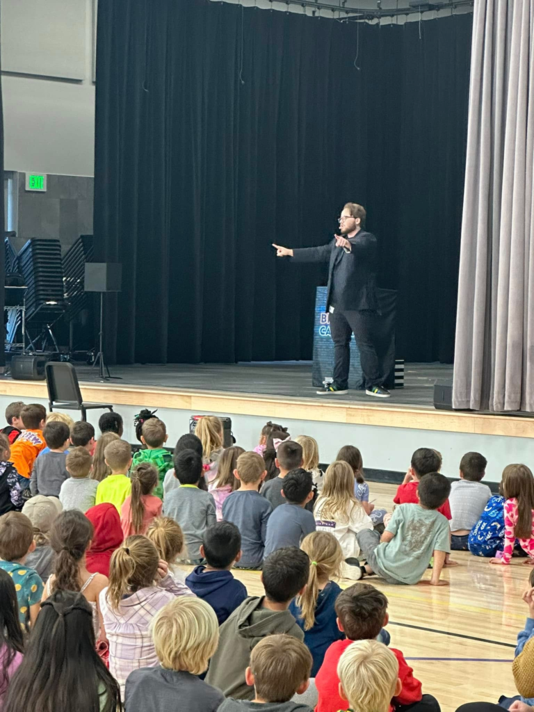 Magician Braden Carlisle Performing Magic at a Summer Camp